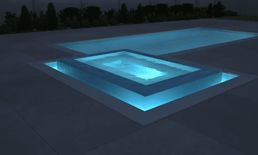 A pool with lights on the bottom of it